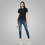 Vero Moda Solid Polo – Classic Black Elegance for Women